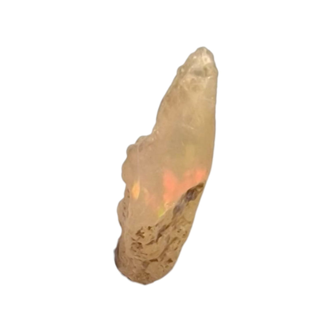 Polished Ethiopian Fire Opal gemstone showing vibrant hues of fiery orange, red, and yellow with radiant flashes.