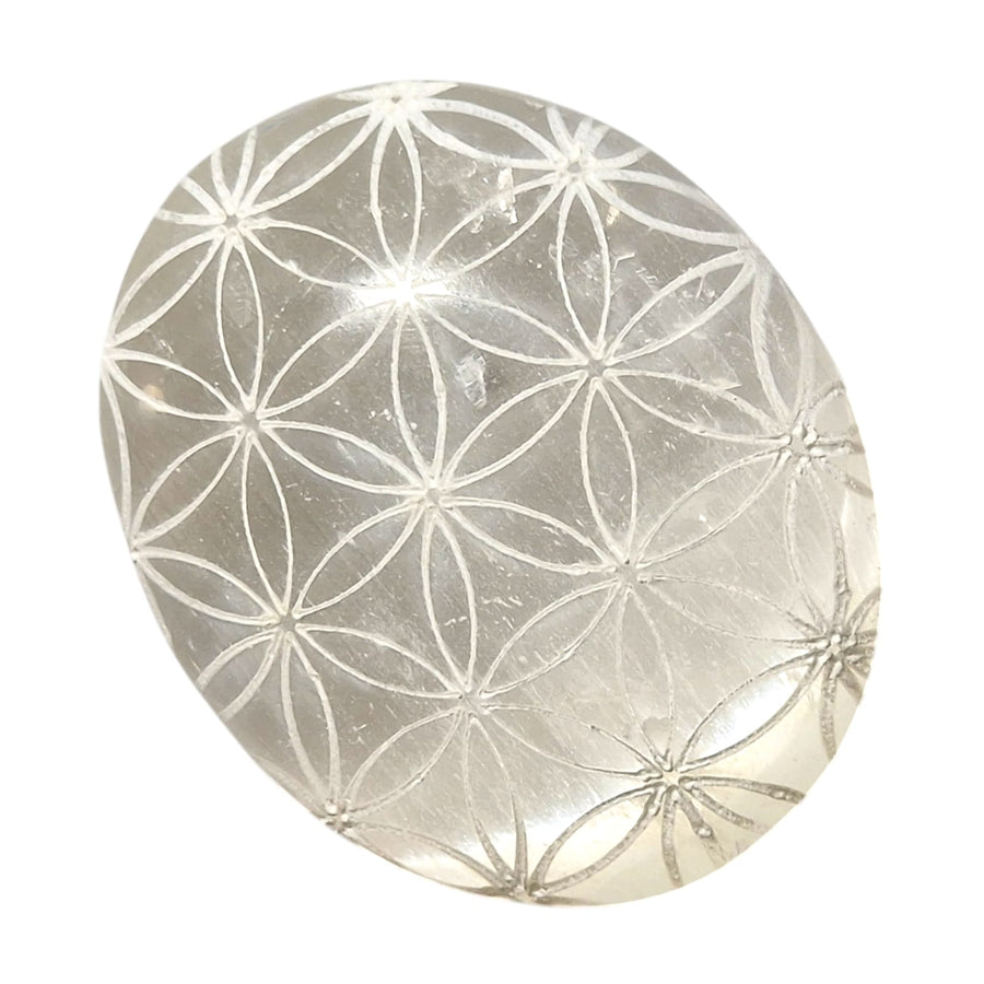 Selenite Flower of Life Medium Oval Palm Stone by GeoFossils – smooth, medium-sized oval selenite stone with engraved Flower of Life, perfect for spiritual cleansing, harmony, and connecting with the Crown Chakra.