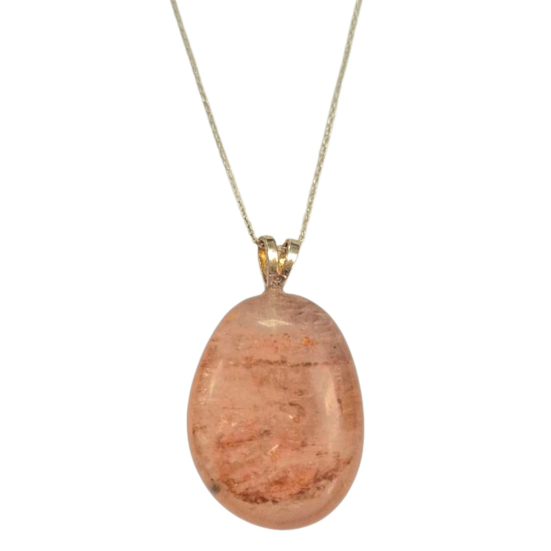 Agnitite pendant featuring red hematite inclusions in quartz, set in hallmarked sterling silver – high-energy transformation crystal with optional silver chain
