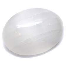 Selenite Palm Stone 50 mm shown on white background.
