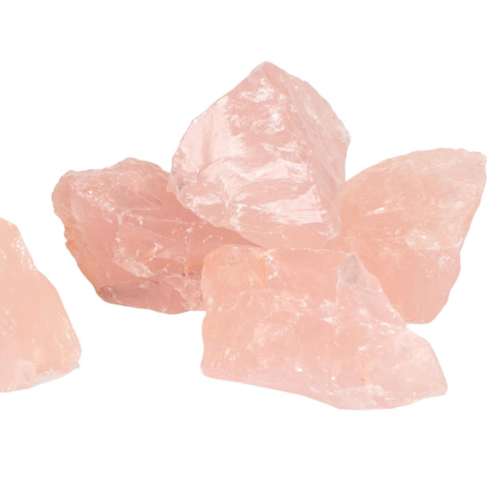 Raw Rose Quartz Chunks – pink, unpolished stones radiating loving energy, ideal for Heart Chakra healing and connected to Taurus, Libra, and the Water element.