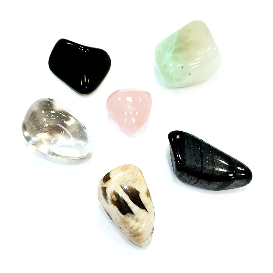 GeoFossils Grief Support Crystal Set, a lovingly curated healing kit with Green Moonstone, Ancestralite, Apache Tears, and more to support emotional healing through grief.