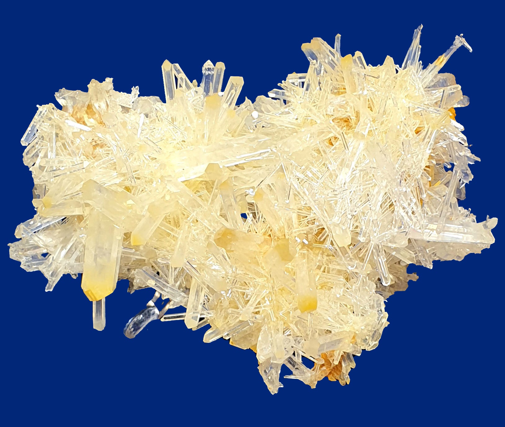 Mango Quartz is crystal clear with yellow tips, fine quartz fingers, large points with crown effect. White with yellow/orange tips irregular shape