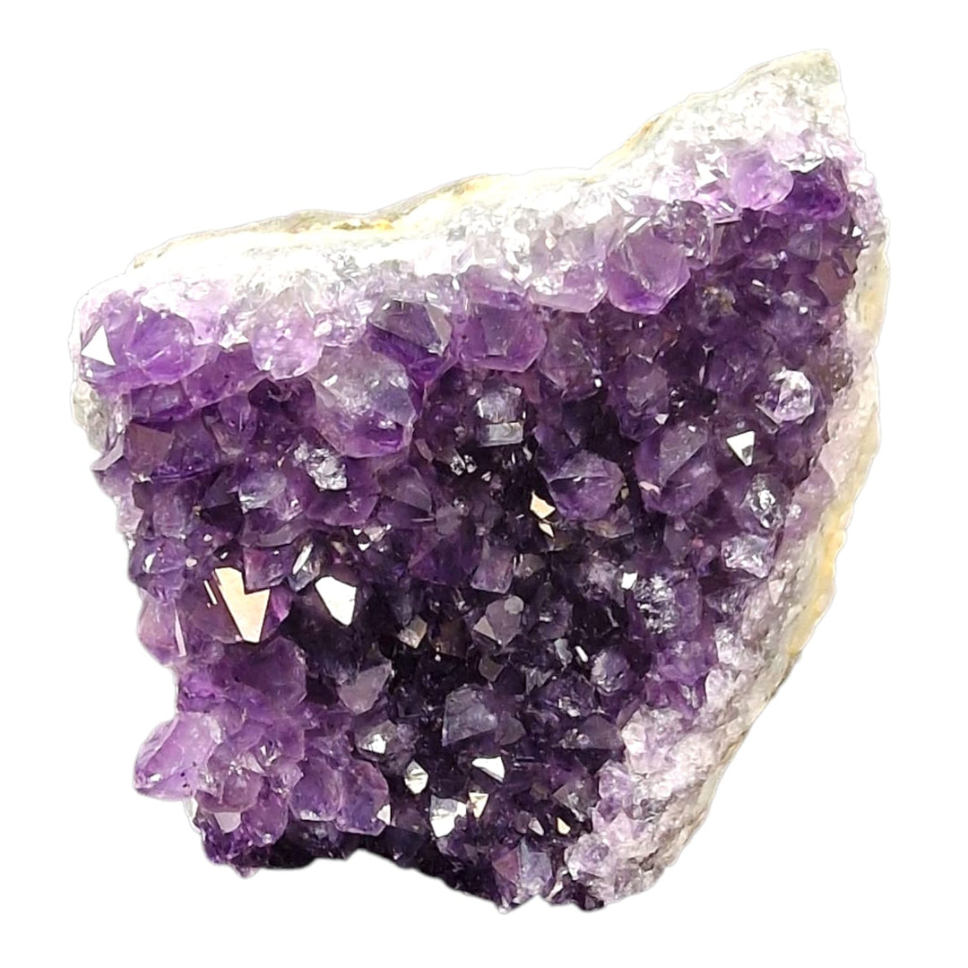 GeoFossils Amethyst Free Form with polished base, a raw standing crystal for calming energy and spiritual alignment.
