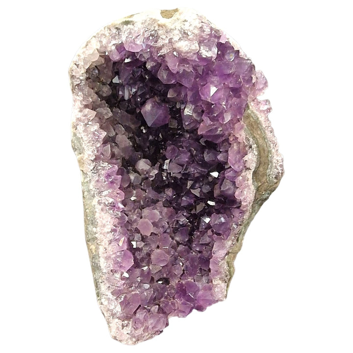 GeoFossils Amethyst Free Form with polished base, a raw standing crystal for calming energy and spiritual alignment.