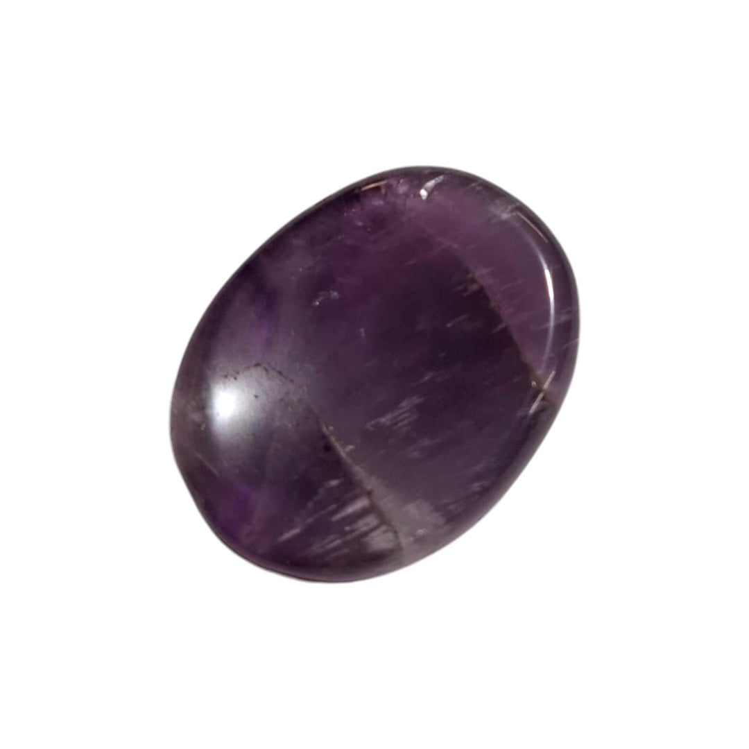 Amethyst Worry Stone by GeoFossils – smooth, oval-shaped stone with a rich purple hue, perfect for calming, spiritual connection, and enhancing the Third Eye and Crown Chakras, linked to the Air and Water elements.