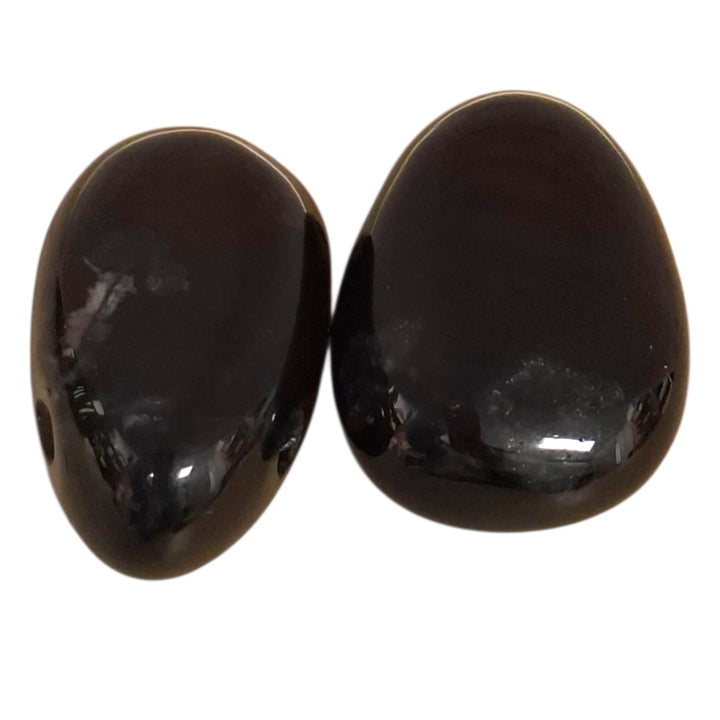 Black Tourmaline drilled tumble stone pendant on a black cord – grounding and protective black crystal for energy shielding and emotional strength
