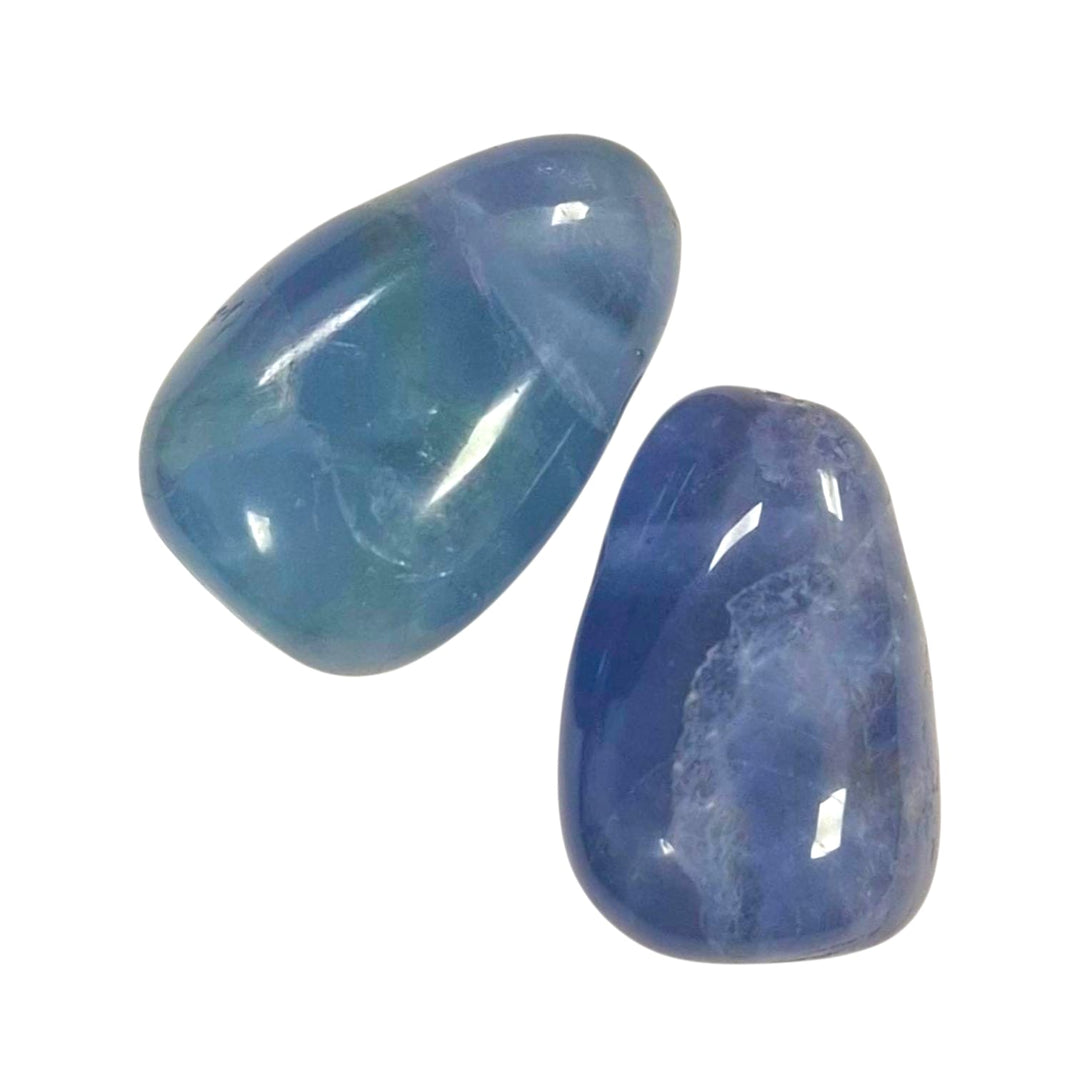 GeoFossils Blue Fluorite Drilled Tumble Stone – soft blue crystal with horizontal drill hole for mental clarity, peaceful communication and intuitive flow