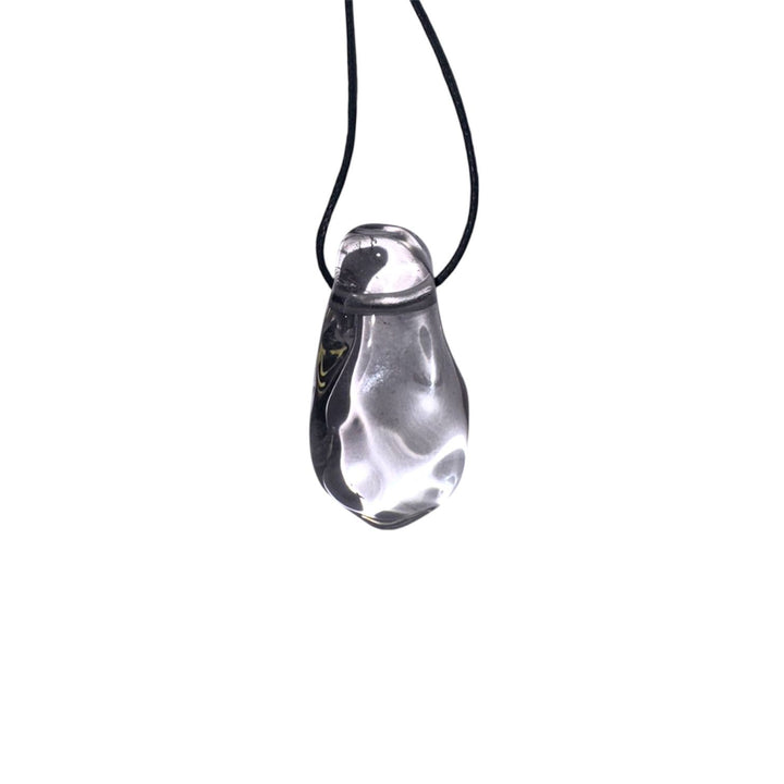 Prasiolite drilled tumble stone pendant with black cotton cord – polished pale green crystal for spiritual growth, clarity, and everyday wear