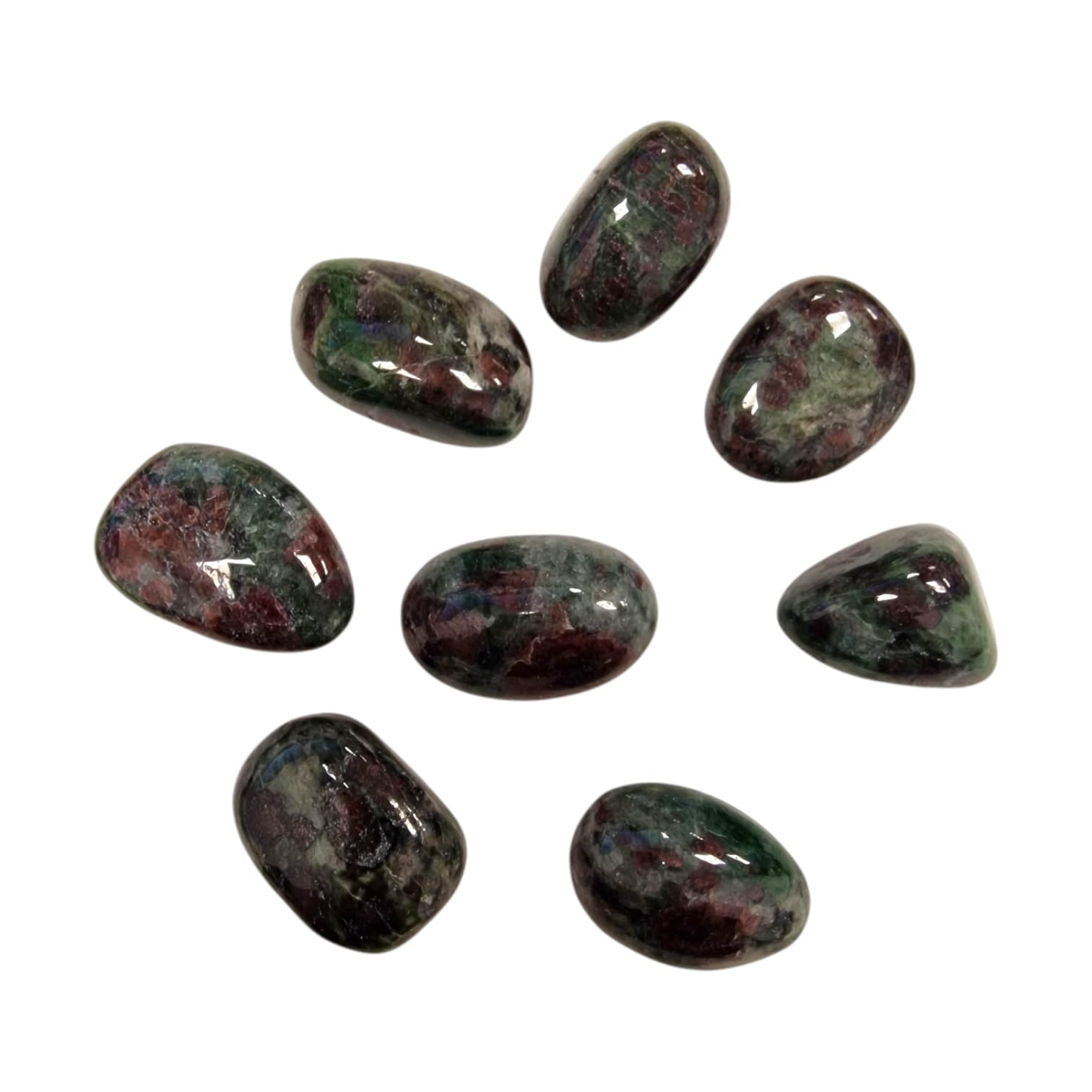 GeoFossils Eclogite Tumble Stone, a rare green and red metamorphic crystal for strength, resilience, and transformation.