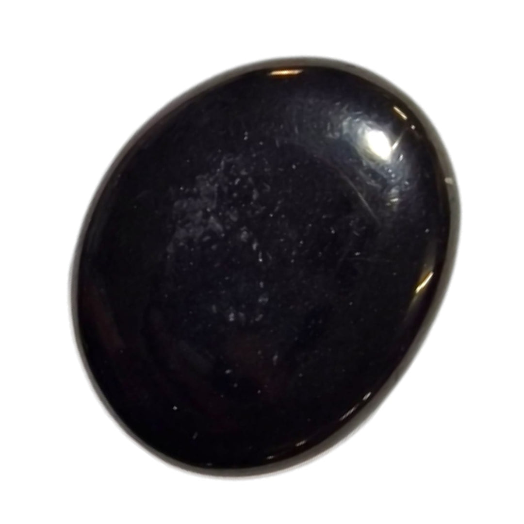 GeoFossils Jet Medium Oval, a protective black crystal for grounding, shielding, and emotional resilience.