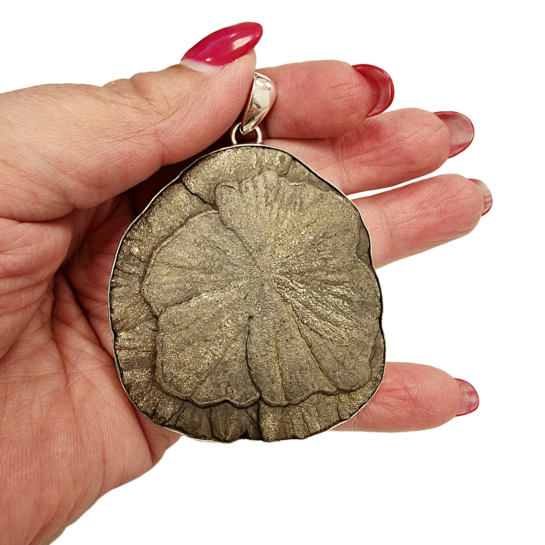 GeoFossils Pyrite Sun Pendant – side profile showing depth and natural pyrite formation in silver mount