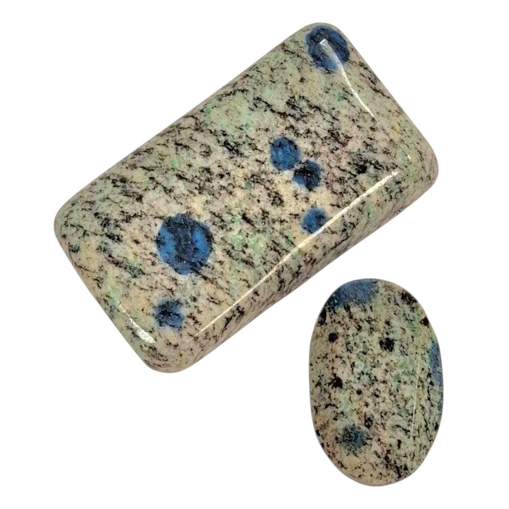 K2 Stone drilled tumble stone pendant on a black cord – white and blue granite crystal for insight, spiritual awareness and emotional balance