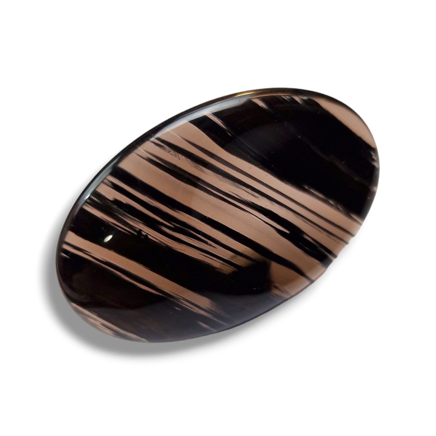 Midnight Lace Obsidian Thumb Stone by GeoFossils – smooth, dark oval stone with delicate lace-like patterns, perfect for grounding, protection, and connecting with the Root Chakra, associated with the Earth element.