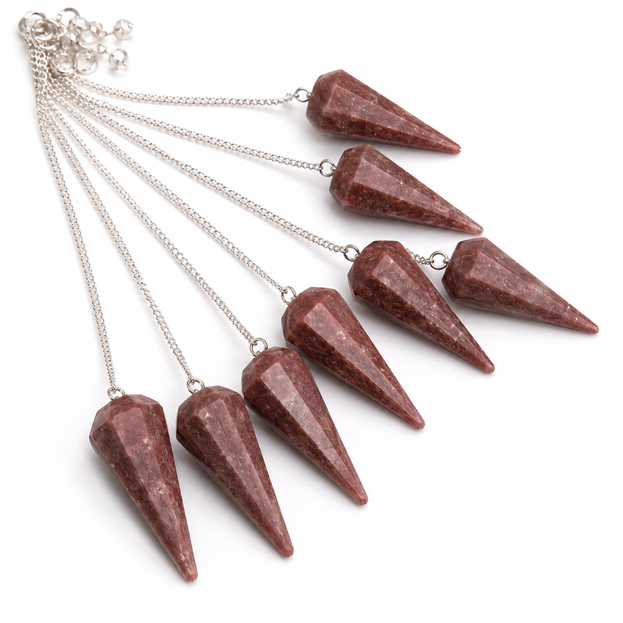 Six red conical stone pendants on silver chains, arranged in a fan shape against a plain white background.
