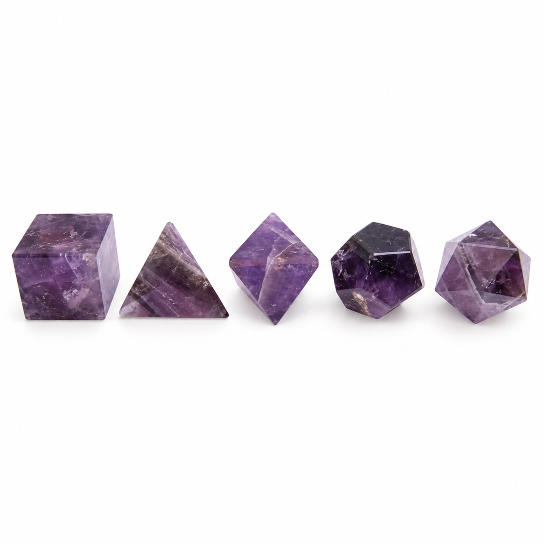 GeoFossils five-piece Amethyst Platonic set featuring polished purple tetrahedron, cube, octahedron, dodecahedron and icosahedron shapes.