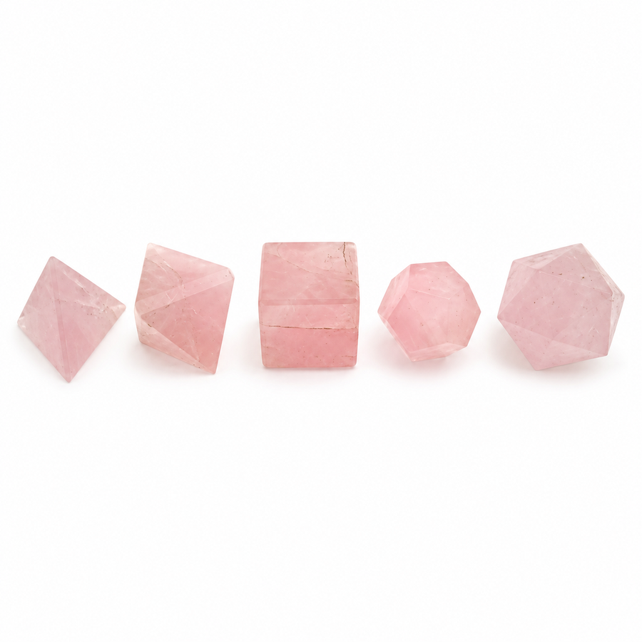 GeoFossils five-piece Rose Quartz Platonic set with polished pink tetrahedron, octahedron, cube, dodecahedron and icosahedron on a white background.