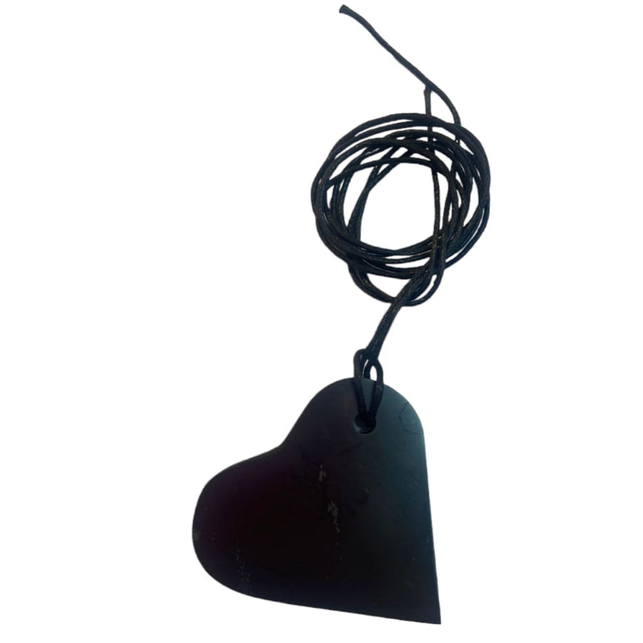 Smooth dark grey Shungite heart pendant with gentle curves, suspended on an adjustable necklace cord