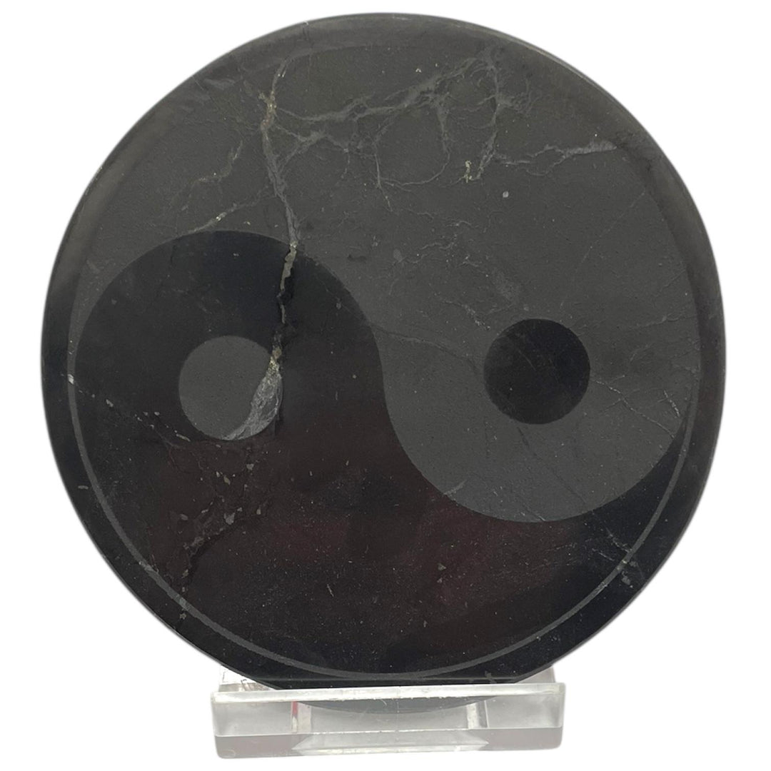 Shungite Yin Yang Charging Disc – polished black plate engraved with the Yin Yang symbol for balance and grounding