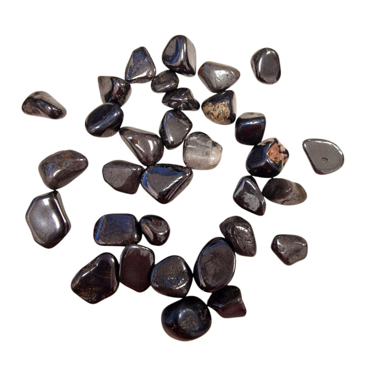 GeoFossils Alabandite Tumble Stone, a super rare black crystal from Arusha, Tanzania, promoting protection, grounding, and transformation.