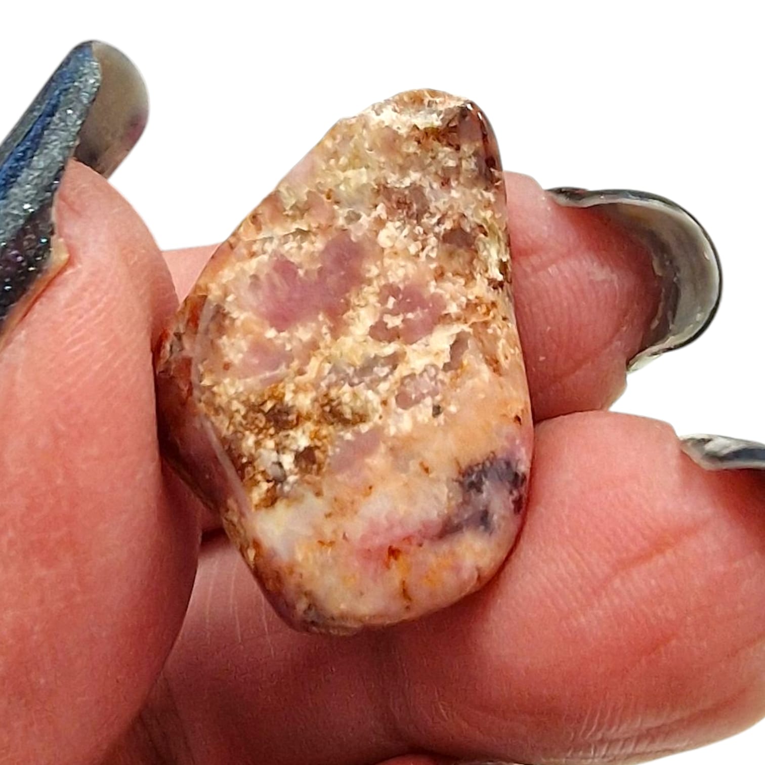 GeoFossils Bustamite Rare Tumble Stone, a soft pink to peach crystal for emotional healing, self-love, and gentle transformation.
