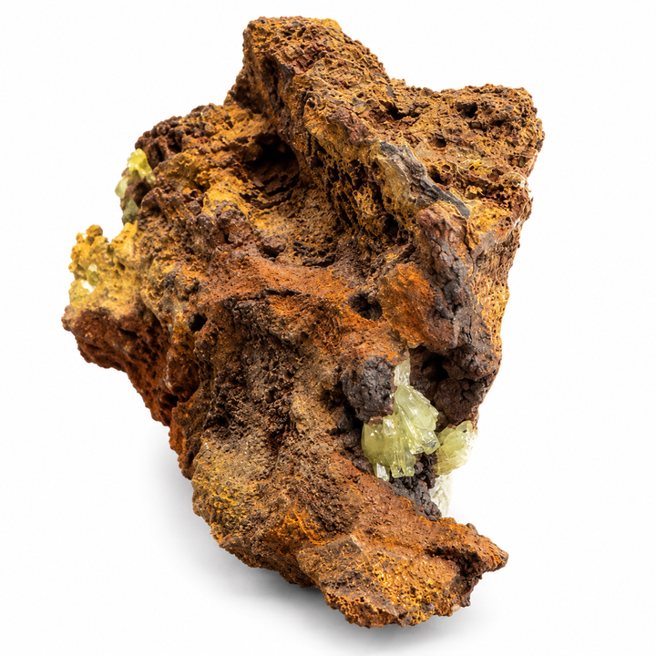 GeoFossils Adamite specimen 190 in daylight, showing a rugged brown matrix with a small pale green crystalline cluster in a cavity.