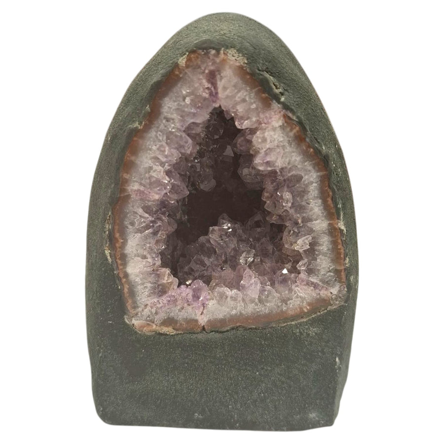 Small amethyst geode with deep purple crystal points, ideal for a work desk or meditation space, weighing 1.12kg and easy to reposition.