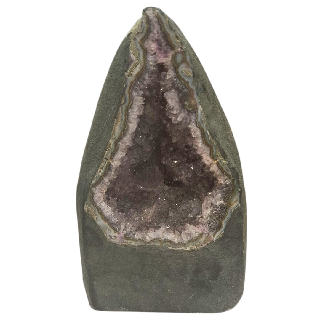 Amethyst geode with internal crystal formation resembling a meditating figure, deep purple crystal points, 2.41kg, perfect for spiritual and calming spaces.