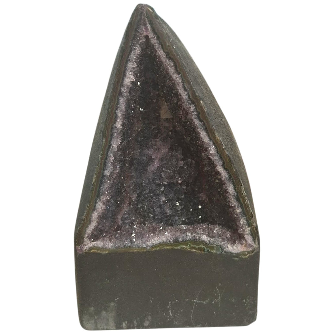 Triangular-shaped amethyst geode with small, deep purple crystals and a light, joyful energy, 4.38kg, ideal for nurturing or creative spaces.