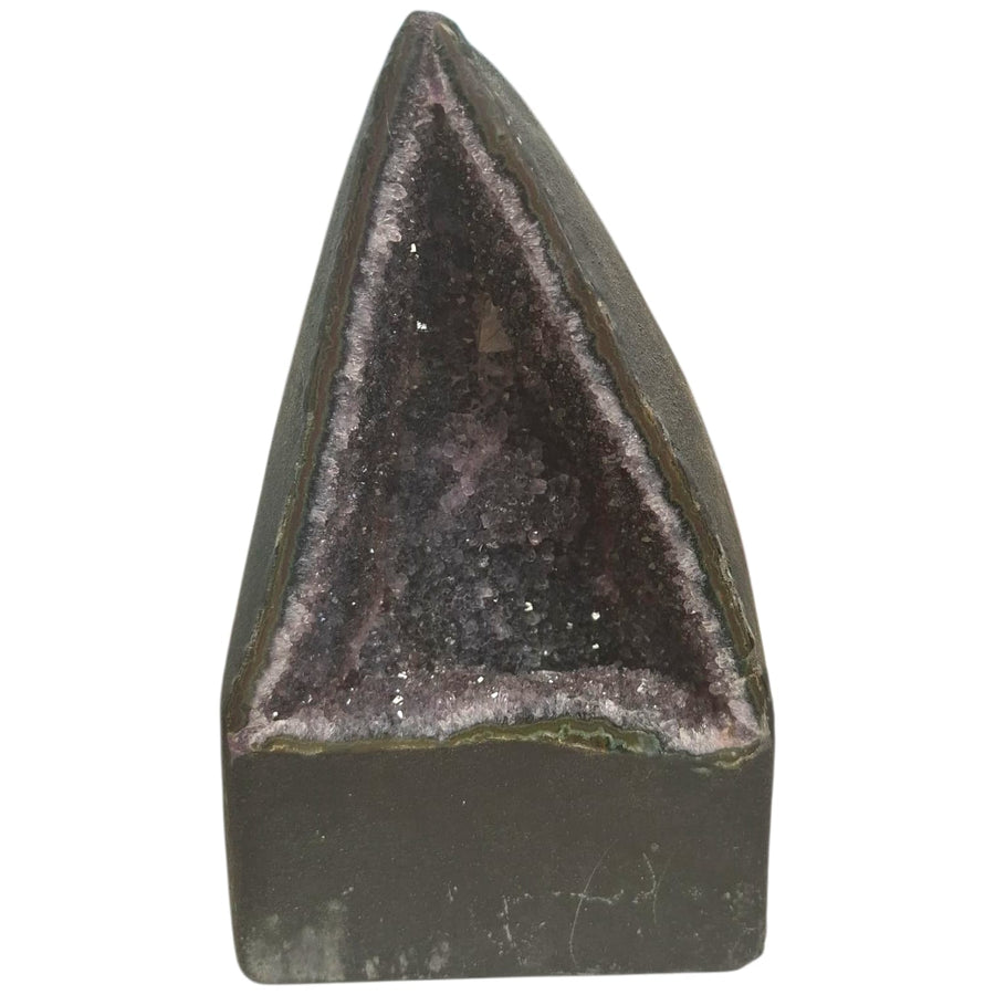 Triangular-shaped amethyst geode with small, deep purple crystals and a light, joyful energy, 4.38kg, ideal for nurturing or creative spaces.