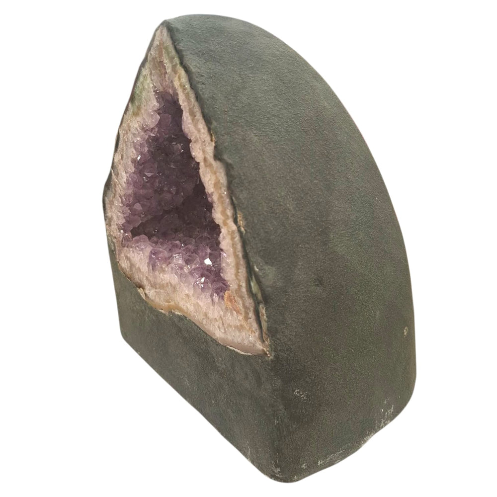 Large amethyst geode with calcite and smokey quartz inclusions at matrix, 5.19kg, featuring deep crystal colour and natural mineral textures. Side Profile