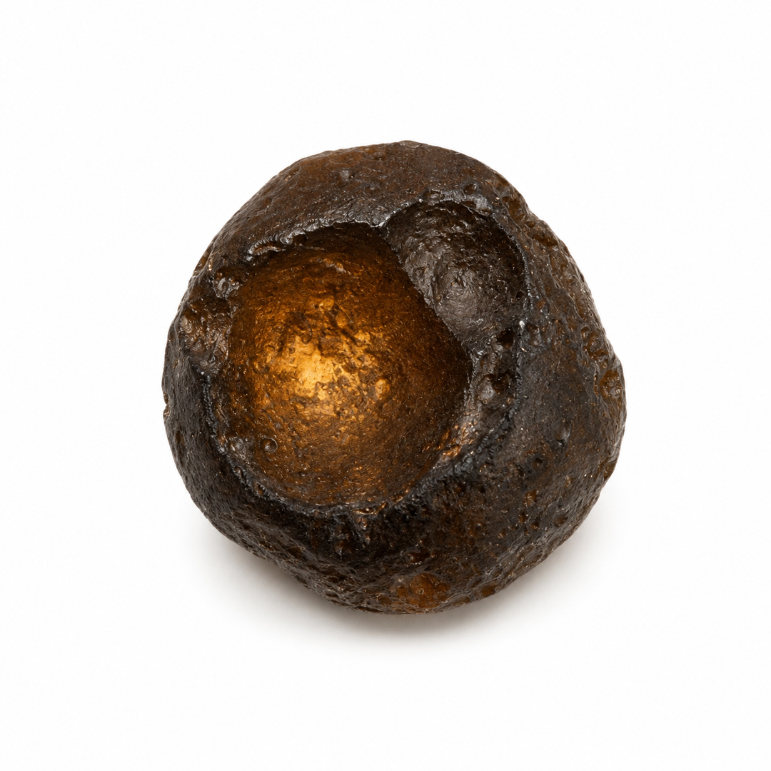 Natural Australite tektite displaying aerodynamic form.