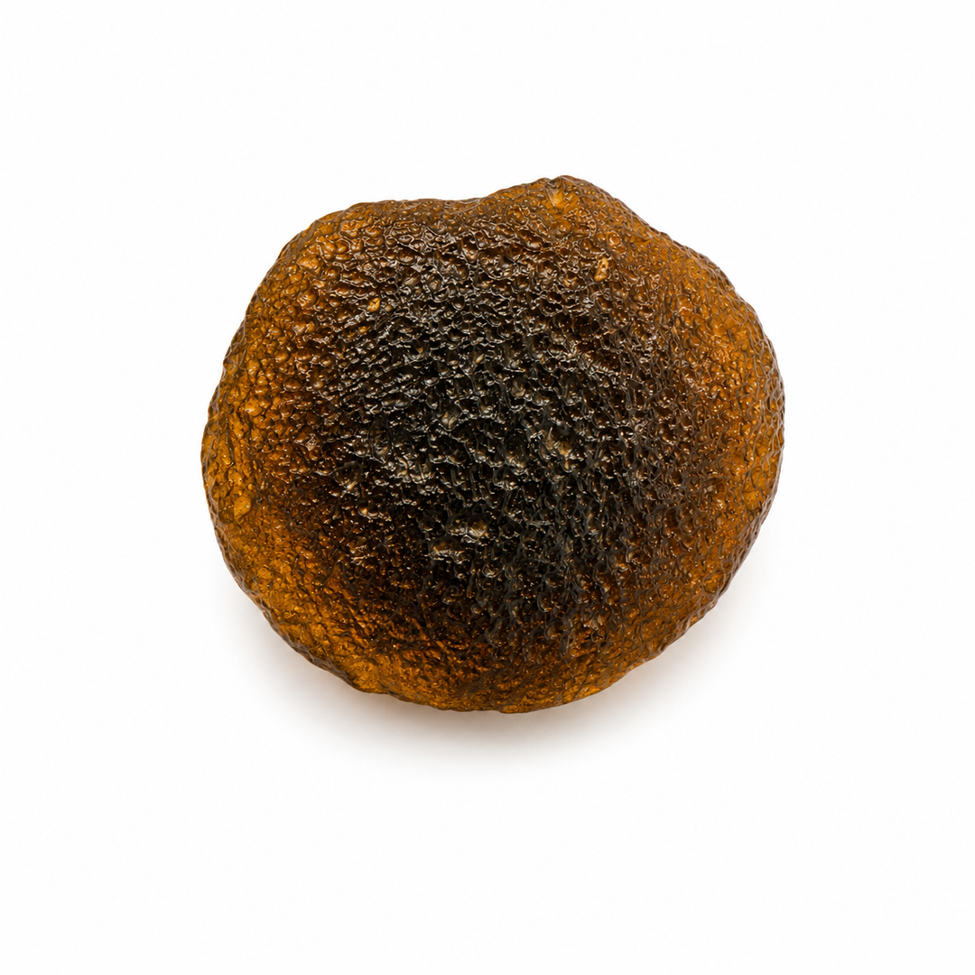 Raw Australite showing natural surface texture.
