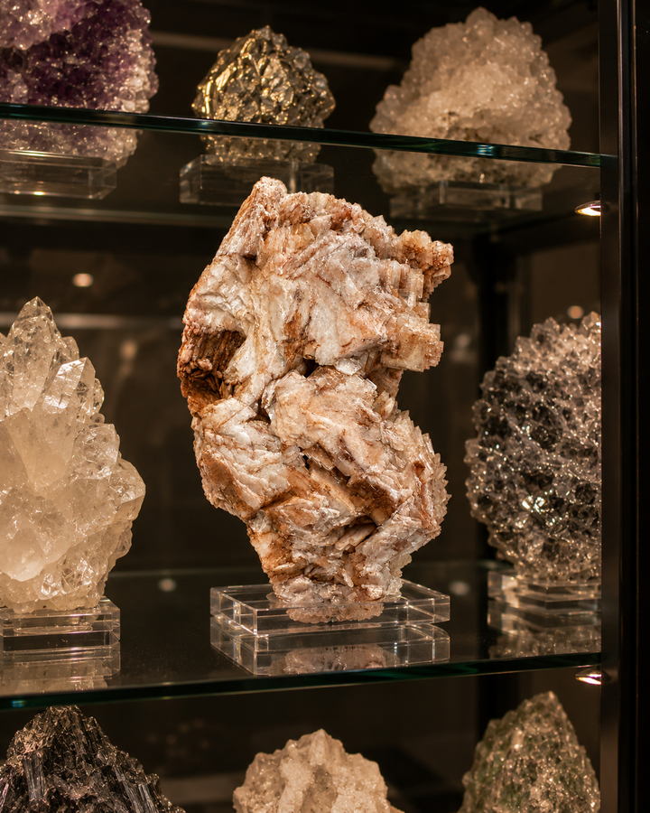 Natural Baryte specimen from Ton Mawr Quarry, Cardiff, Wales, displayed in a collector's mineral cabinet alongside other fine mineral specimens.