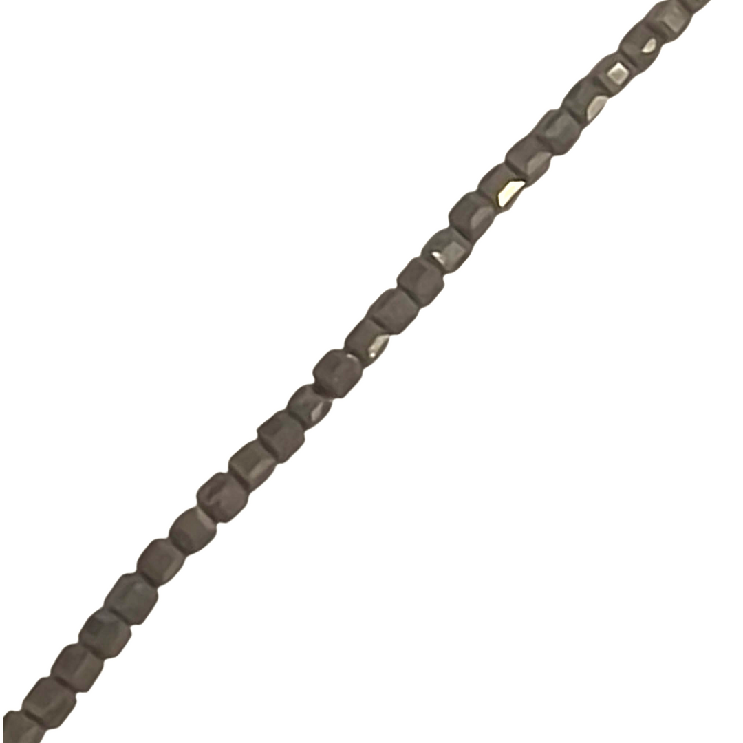 Pyrite 4mm cube beads on a white background