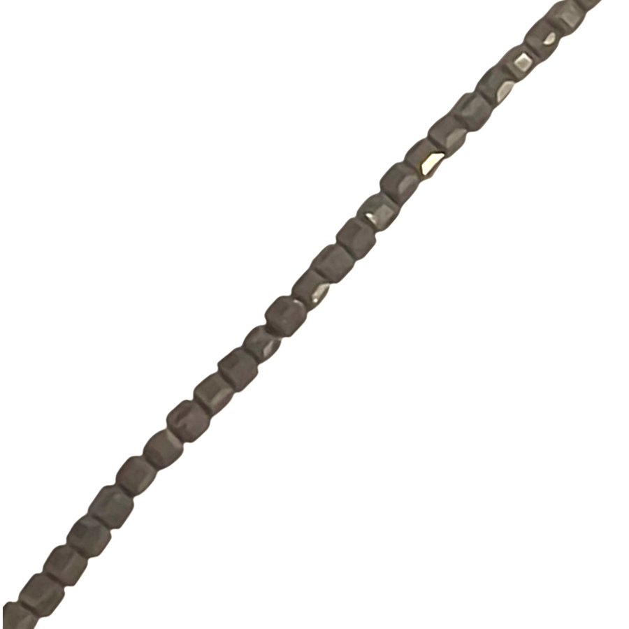 Pyrite 4mm cube beads on a white background