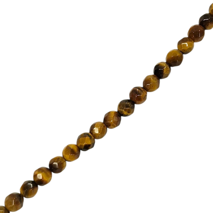 Close-up of Gold Tigers Eye 4mm faceted round beads showing shimmer and detail