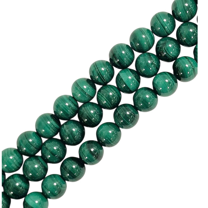 Close-up of Malachite round beads showing natural patterns