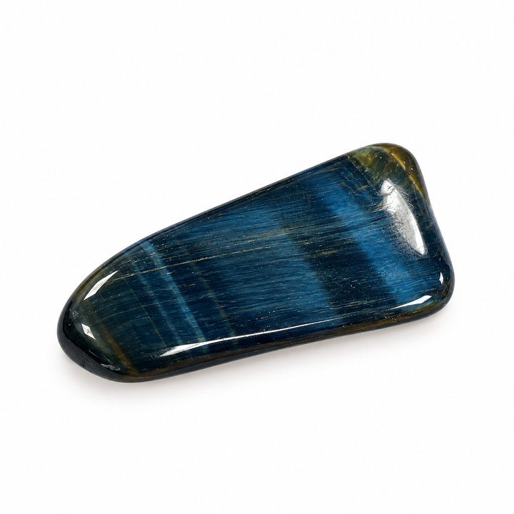Polished Blue Tiger's Eye tumble stone displaying dark blue-grey colouring and subtle fibrous banding, part of the GeoFossils Scorpio Zodiac Crystal Set.