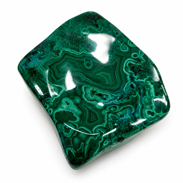 Genuine Malachite trinket bowl displaying natural swirling green mineral patterns