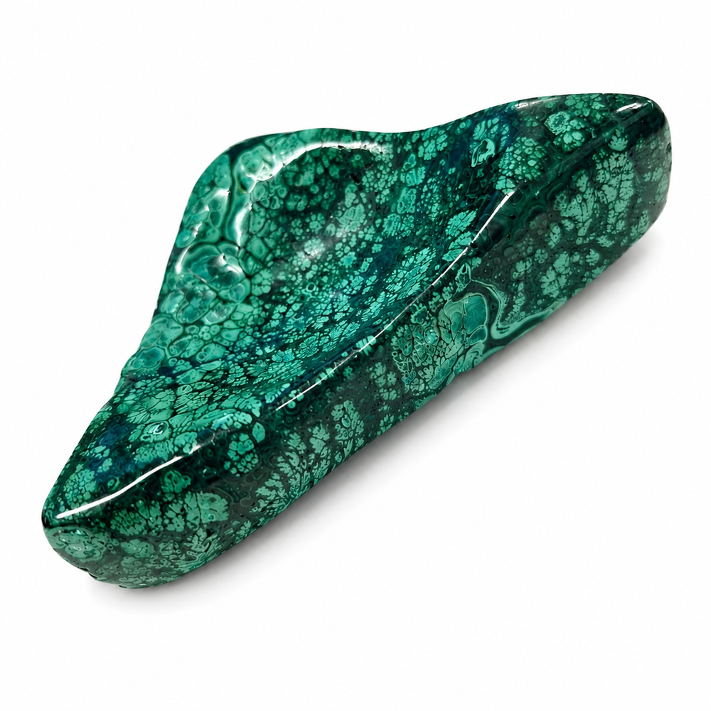 Natural Malachite bowl displaying intricate emerald green cellular patterns and freeform shape