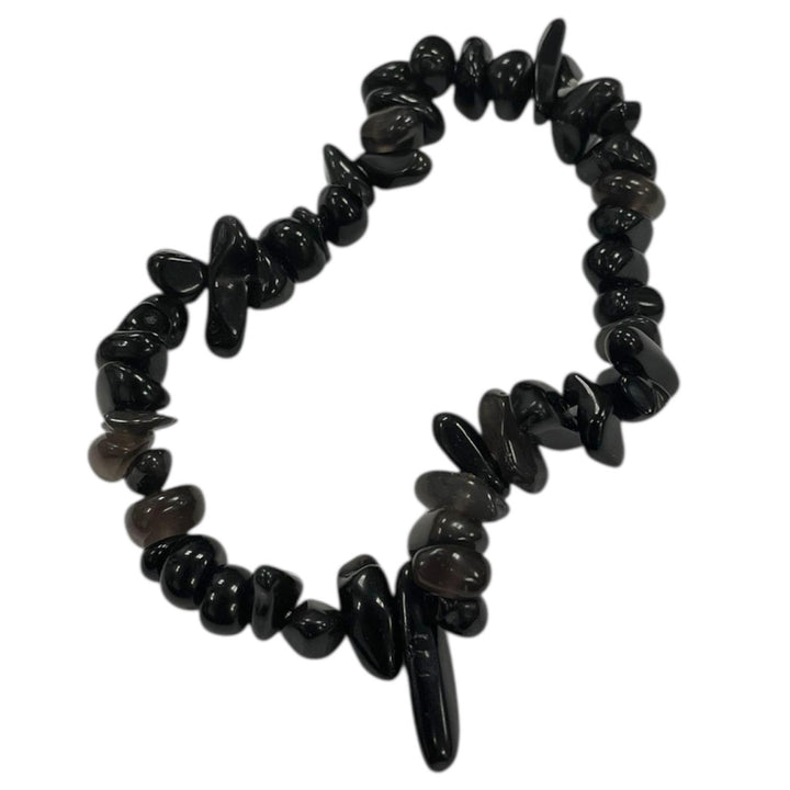 GeoFossils Black Obsidian gem chip bracelet with glossy, irregular chips strung on elastic, used for protection, grounding, and energy shielding in crystal healing.