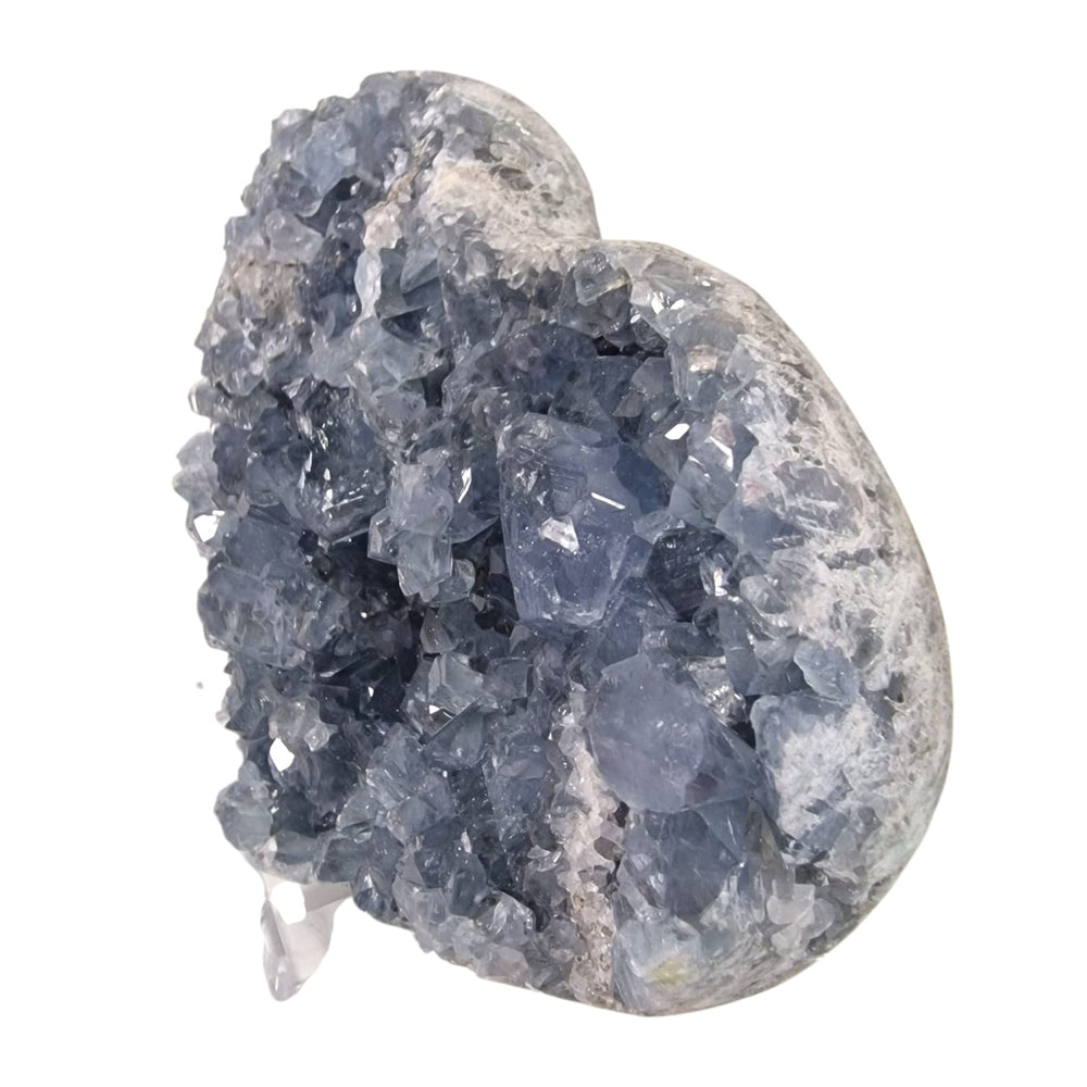 Flat celestite heart with sparkling clusters, 1.02kg, perfect for altars and sacred spaces, promoting calm, clarity, and spiritual alignment.