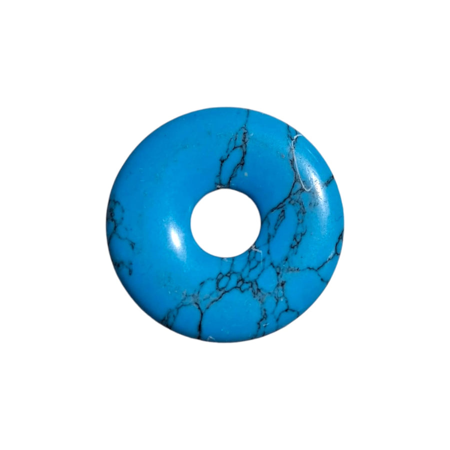 Turquenite (Blue Howlite) Munay Ki Pi Donut by GeoFossils – smooth, vibrant blue stone with gentle white veining, perfect for relaxation, clarity, and connecting with the Throat and Crown Chakras in Andean spiritual practices.