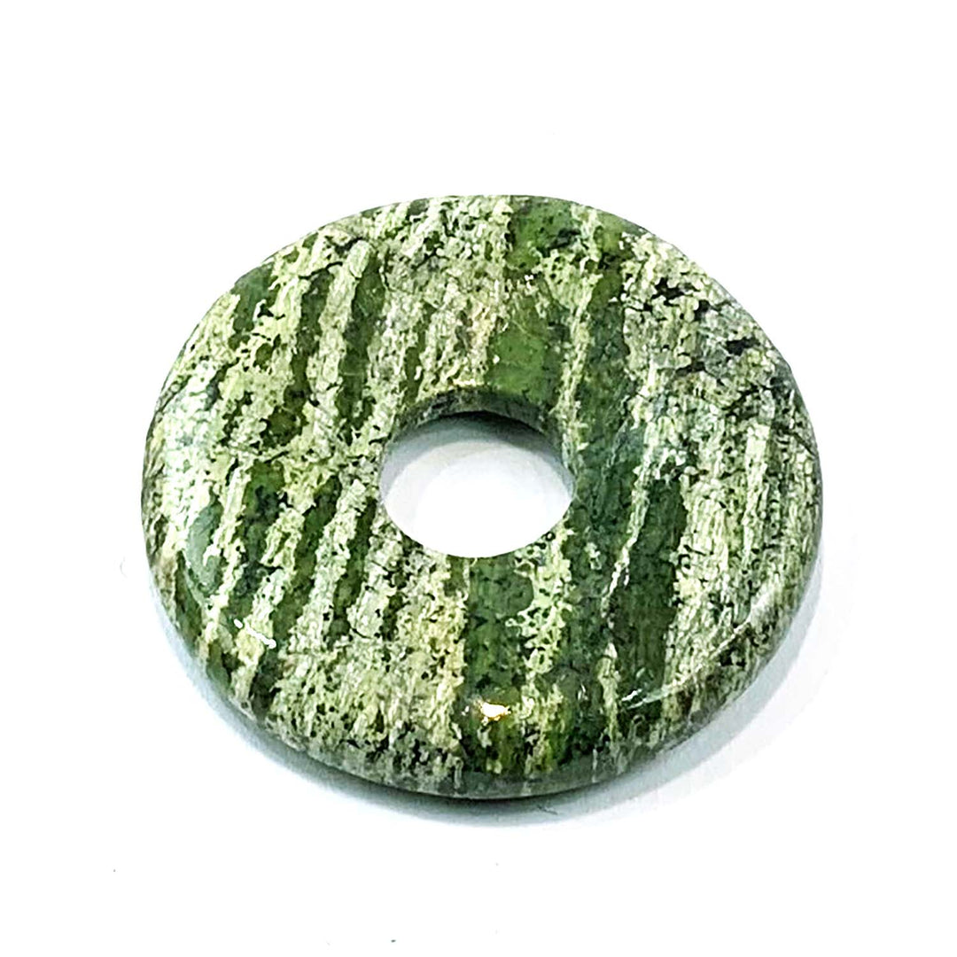 Chrysotile Munay Ki Pi Donut by GeoFossils – smooth, circular stone with earthy green and grey tones, perfect for grounding, protection, and connecting with the Root Chakra in Andean spiritual practices.