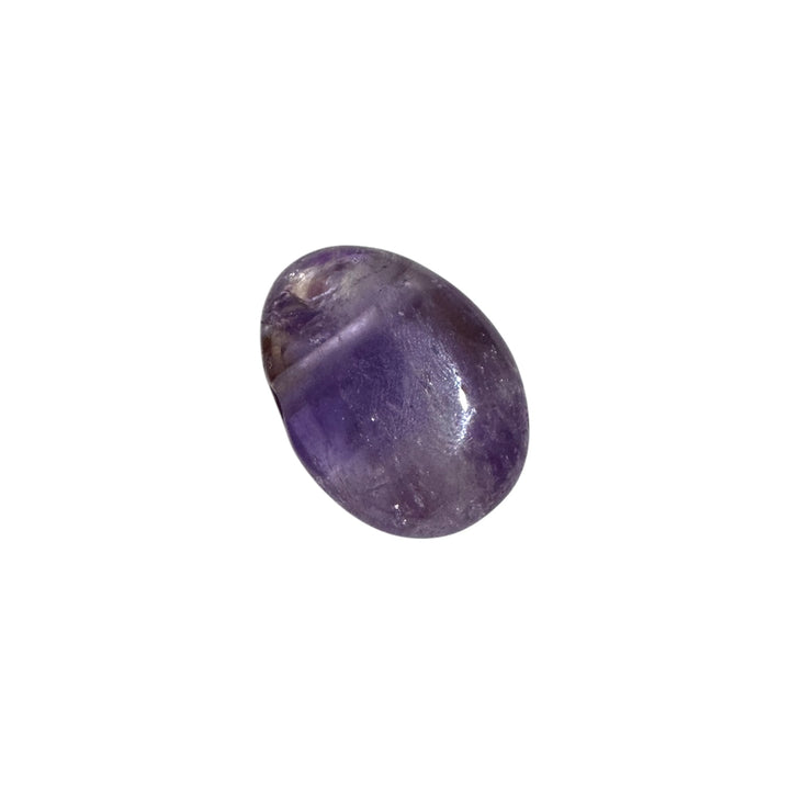 Close-up of Ametrine drilled tumblestone showing natural transition between Citrine and Amethyst in a single polished ston