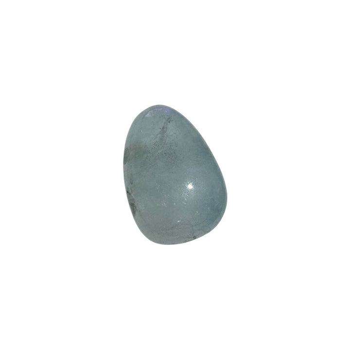 Close-up of Aquamarine drilled tumblestone showing natural pale blue hues and a smooth polished surface