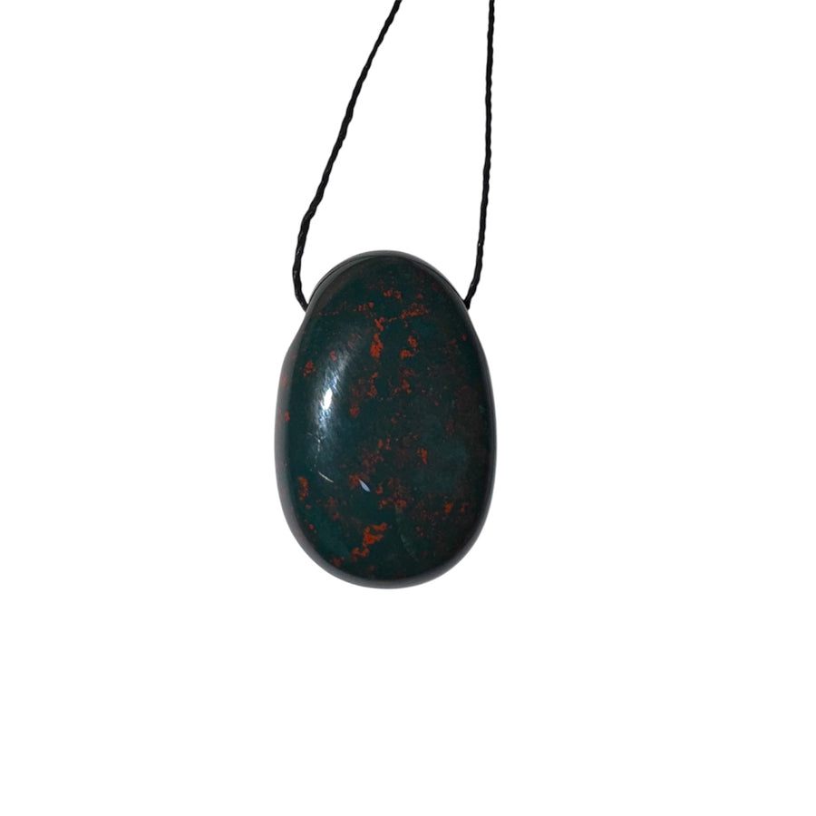  Polished Bloodstone drilled tumblestone with deep green base and red flecks, threaded on black cord for grounding and vitality