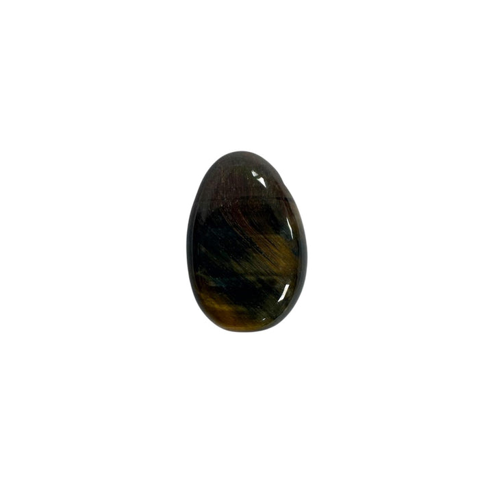 Drilled Blue Tiger’s Eye tumble stone featuring rich blue-black hues and natural shimmering bands across the surface.