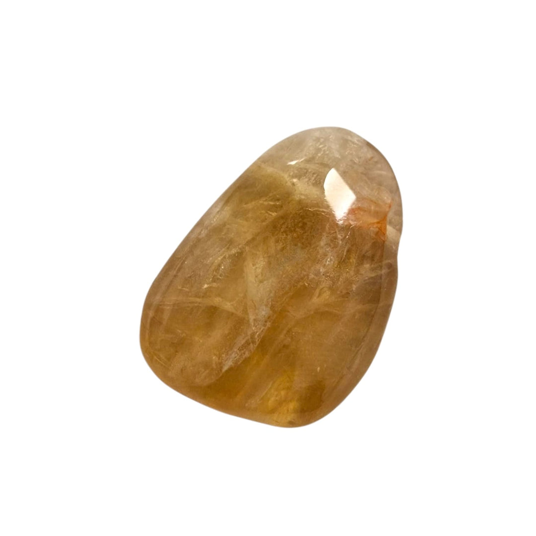 GeoFossils Honey Calcite drilled crystal with warm yellow colour and smooth surface